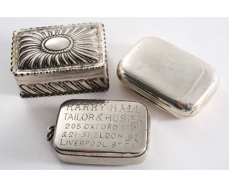 A VICTORIAN VESTA BOX of plain rounded oblong form with an engraved striker along the back and a gilt interior, by E.H. Stock