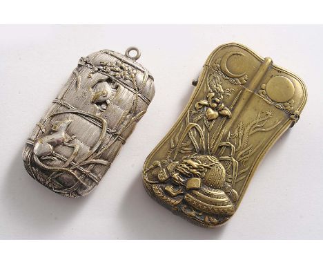 A JAPANESE PLATED BRASS VESTA CASE in the form of a tied bundle or sack of seed with two rodents playing on each side, c.1895