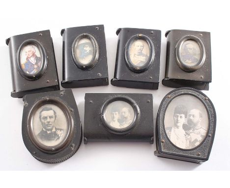 SEVEN VARIOUS 20TH CENTURY VULCANITE VESTA CASES Each set with a printed or photographic portrait (Baden Powell, King Edward 