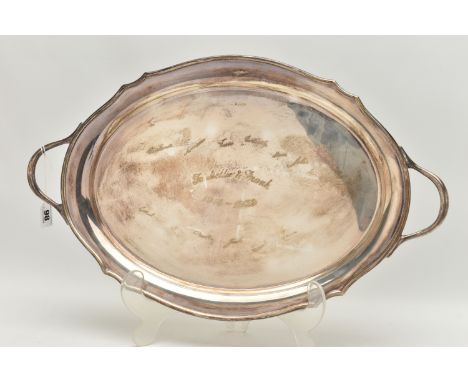 A GEORGE VI SILVER OVAL TWIN HANDLED TRAY WITH WAVY EDGE, the front inscribed with presentation inscription and facsimile sig