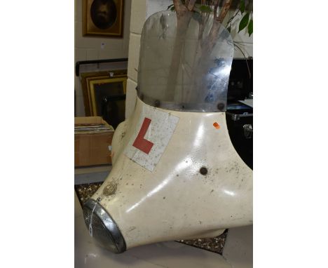 A 1950'S/1960'S MOTORCYCLE FAIRING, of fibreglass construction with windscreen and Lucas headlamp lens, used condition with s