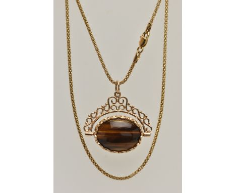 A 9CT GOLD GEM SET SWIVEL FOB PENDANT AND CHAIN, oval swivel fob set with onyx and tiger eyes, to a scroll surmount, fitted w