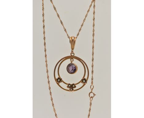AN EARLY 20TH CENTURY YELLOW METAL LAVALIER PENDANT NECKLACE, the pendant of an open work circular form, with a circular cut 