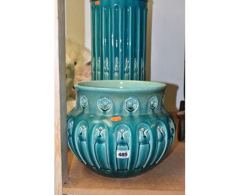 A BRETBY JARDINIERE AND STAND, an arts and crafts style turquoise glazed pottery jardiniere with a moulded flower head and st