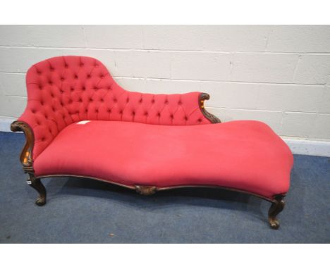 A VICTORIAN MAHOGANY CHAISE, with light red buttoned upholstery, on front cabriole legs, length 190cm x depth 85cm x height 8