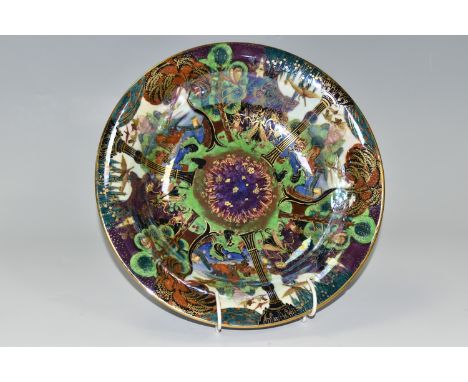 DAISY MAKEIG-JONES FOR WEDGWOOD, A FAIRYLAND LUSTRE SHALLOW BOWL, the interior decorated in The Garden of Paradise pattern, t