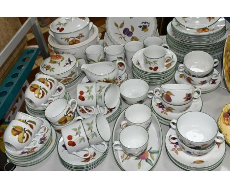 A SEVENTY SEVEN PIECE ROYAL WORCESTER EVESHAM VALE DINNER SERVICE, comprising three tureens of different sizes, a sauceboat a