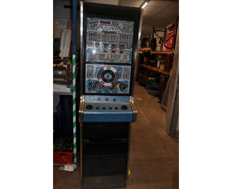 AN ACE COIN EQUIPMENT VINTAGE SLOT MACHINE with 'Silver Machine' graphics and mechanism, width 53cm x depth 55cm x height 188