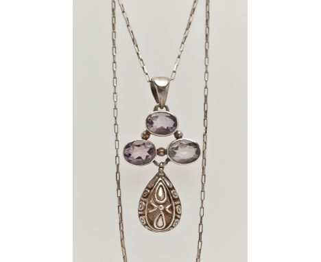 A WHITE METAL GEM SET PENDANT NECKLACE, the pendant set with three oval cut amethysts, with a textured white metal drop, fitt