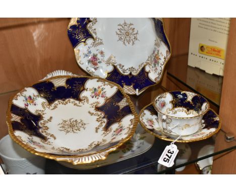 TWO COALPORT DISHES, together with a cup and saucer, cobalt blue panels, Y2665 pattern inside cup, trailing floral design alo
