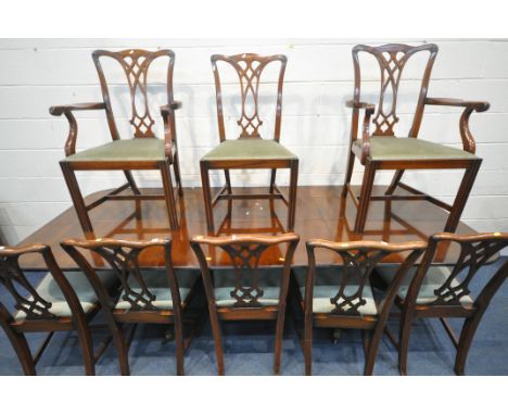 A 19TH CENTURY MAHOGANY TWIN PEDESTAL DINING TABLE, with two additional leaves and supports, open length 260cm x closed lengt