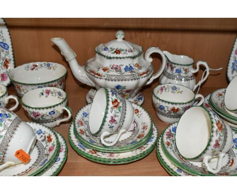 A COPELAND SPODE 'CHINESE ROSE' PATTERN TEA SERVICE, comprising tea pot on stand, milk jug, sugar bowl, two bread and butter 