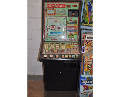 A MAYGAY FRUIT MACHINE with 'Monopoly' graphics and mechanism, height 182cm (untested and may be internally incomplete)