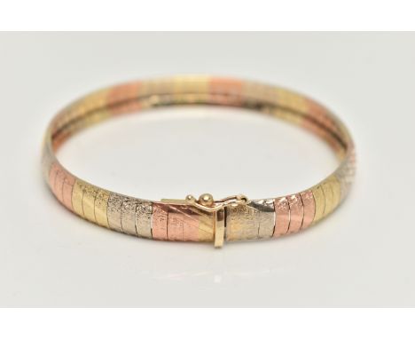 AN ITALIAN TRI COLOUR BRACELET, articulated rose, white and yellow metal bracelet with textured and diamond cut pattern detai