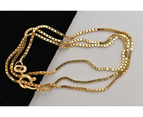 A YELLOW METAL CHAIN NECKLACE, fine box link chain, fitted with a spring clasp, approximate length 425mm, stamped 750, approx