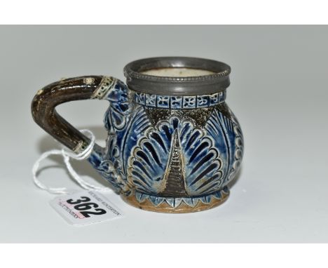 A ROBERT WALLACE MARTIN FOR MARTIN BROTHERS, A STONEWARE MUSTARD POT WITH PEWTER RIM, of bulbous form with angular handle, de