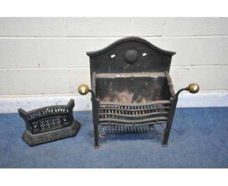 A CAST IRON FIRE GRATE, with brass finials, width 62cm x depth 34cm x height 67cm, along with a cast iron fire grate front (c