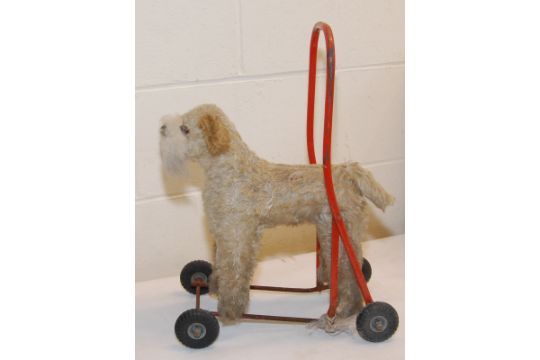 vintage push along dog on wheels