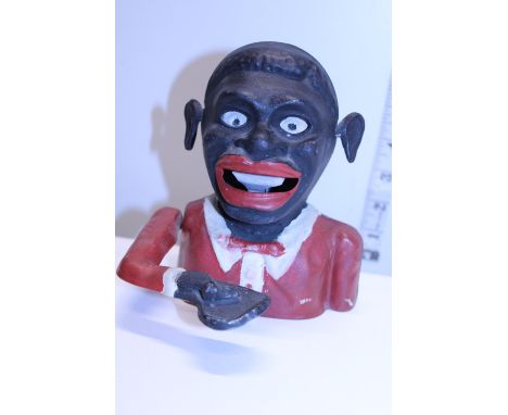A vintage cast iron money box 