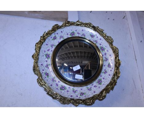 A large ceramic and gilt framed mirror, shipping unavailable 