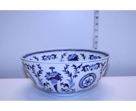 A Oriental ceramic bowl with blue and white glaze 
