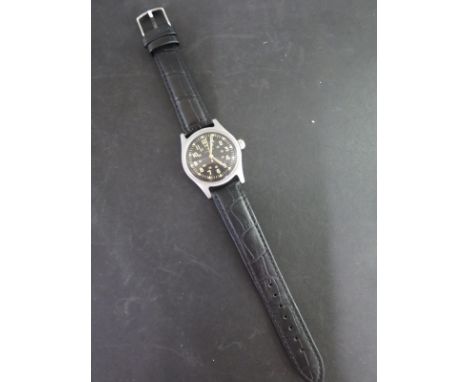 A gentleman's Hamilton wristwatch manual wind GG-W-113 - date August 1969 with black Military dial - Width 37mm  - some usage