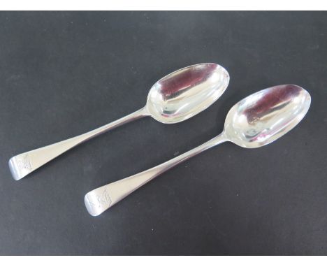 Two Irish spoons - one Dublin 1760 by John Laughlin, the other Dublin 1770 by William Wilkinson - approx 215mm long, approx 4