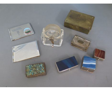 Eight metal cased stamp boxes, three with agate tops and bottoms, one as vesta and stamp box and a glass stamp roller with me