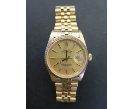 A Rolex 18ct yellow gold wristwatch Oyster Perpetual Datejust Superlative Chronometer bracelet wristwatch manual/automatic - 