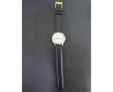 A stainless steel MuDu Doublematic day date 17 jewel manual wind wristwatch - working, clean condition