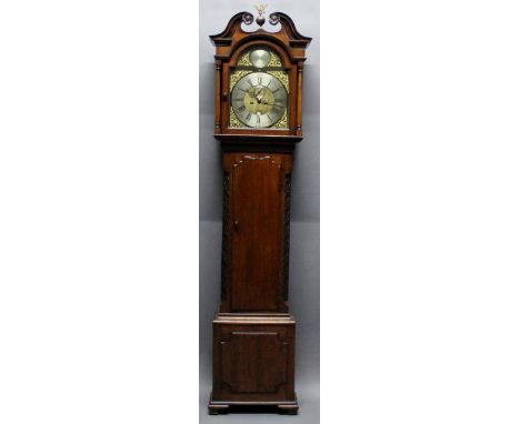 A GEORGE III OAK EIGHT-DAY LONG CASED CLOCK by Barwise of Cockermouth, having a broken swan-neck pediment with brass eagle an