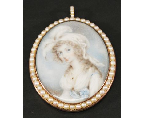 A 19TH CENTURY PEARL SET PORTRAIT MINIATURE MOURNING PENDANT of oval form, watercolours on ivory panel depicting a young lady