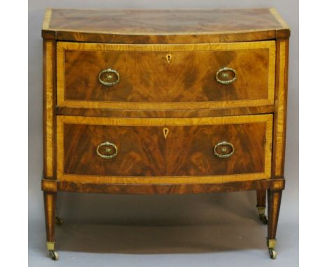 A 19TH CENTURY MAHOGANY BOW-FRONTED CHEST OF DRAWERS having a crossbanded top and two crossbanded drawers each with ring hand