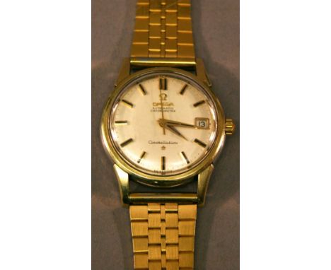 AN OMEGA CONSTELLATION AUTOMATIC CHRONOMETER WRISTWATCH having a circular dial with baton markers and date aperture, replacem