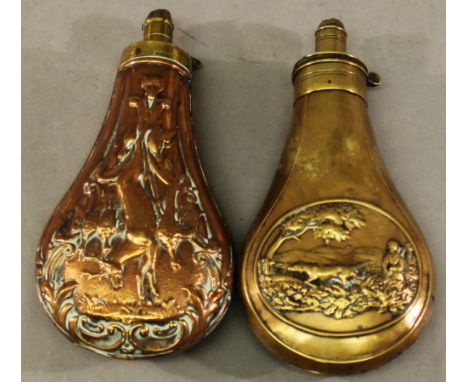 TWO 19TH CENTURY POWDER FLASKS one brass and copper, the other brass, of typical form each with embossed hunting designs.  17