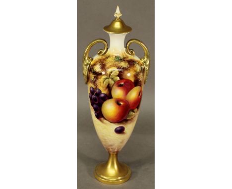 A ROYAL WORCESTER PORCELAIN HAND-DECORATED VASE of slender urn-form with finial topped cover and scrolled handles at the shou