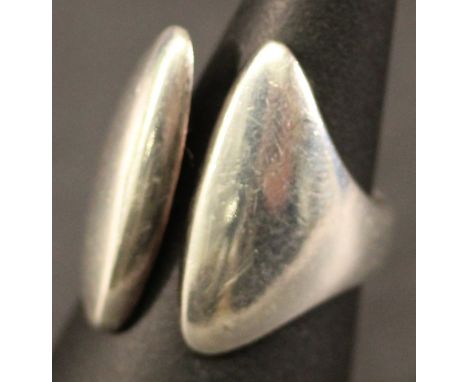 A GEORG JENSEN 925 'KOLMIO' RING of shaped and open form, a design by Hans Hensen, ring size P. 11grams  CONDITION: Some fine