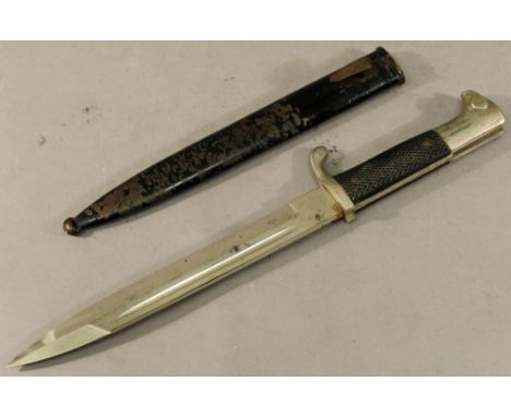 A GERMAN WW2 PARADE BAYONET held within scabbard, marked to blade "Original Eickhorn, Solingen". CONDITION: Handle with some 