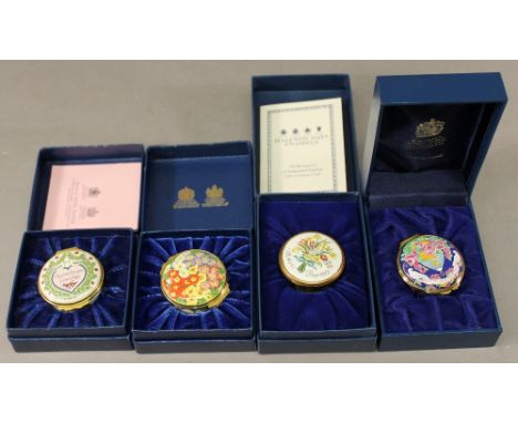 A GROUP OF FOUR HALCYON DAYS ENAMEL TRINKET BOXES each of circular form in the original fitted card box. (4)  CONDITION: Two 