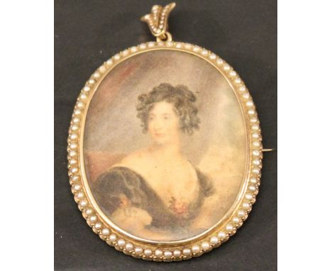 A 15CT GOLD PEARL SET PORTRAIT MINIATURE PENDANT/BROOCH of oval form, watercolours on paper, depicting a period lady, in a pe