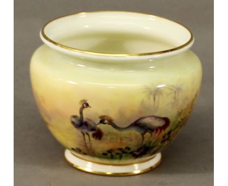 A SMALL ROYAL WORCESTER PORCELAIN HAND-DECORATED PLANTER of shouldered and tapering form, decorated with exotic birds in natu