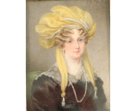 A 19TH CENTURY PORTRAIT MINIATURE of rectangular form, watercolours on ivory panel depicting a lady in opulent dress, in a si