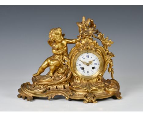 A French ormolu rococo revival mantel clock, 19th century, the twin train movement signed 'G. Poursillie Montauban', no. 436,