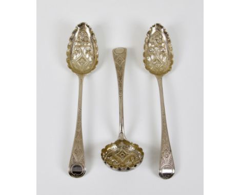 A pair of George III silver berry spoons, Richard Crossley &amp; George Smith, London, 1810, later decorated, 8 5/8in. (22cm.