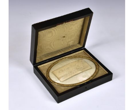 A lock of hair believed to be that of the Duke of Wellington (1769-1852), the hair contained in a small paper envelope, inscr