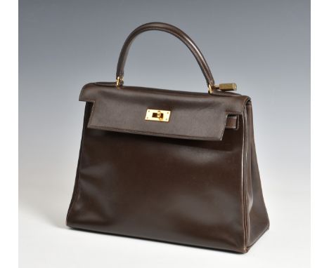 Hermes – a chocolate brown leather Box Kelly Retourne 28 bag, purchased by vendor c.1977/78, with gold tone hardware, stamped