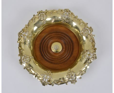 A Victorian silver gilt bottle or wine coaster, Thomas Henry Francis &amp; Frederick Francis, London, 1855, of shaped circula