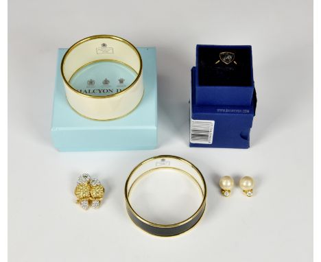 A pair of Christian Dior costume jewellery earrings, pearl and diamond style; together with two Halcyon Days enamel bangles, 