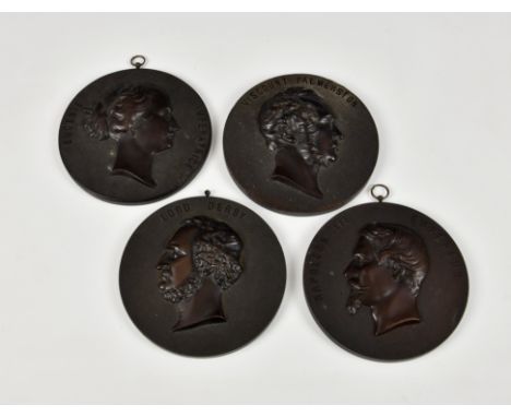 Four Bois Durci vulcanite portrait relief roundels / plaques, second half 19th century, NAPOLEON III EMPEREUR; EUGENIE IMPERA