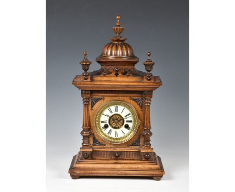 A 'Greenwich Clock' walnut cased mantel clock, early 20th century, made in Germany for W. E. Watts, Nottingham, no.12970, twi